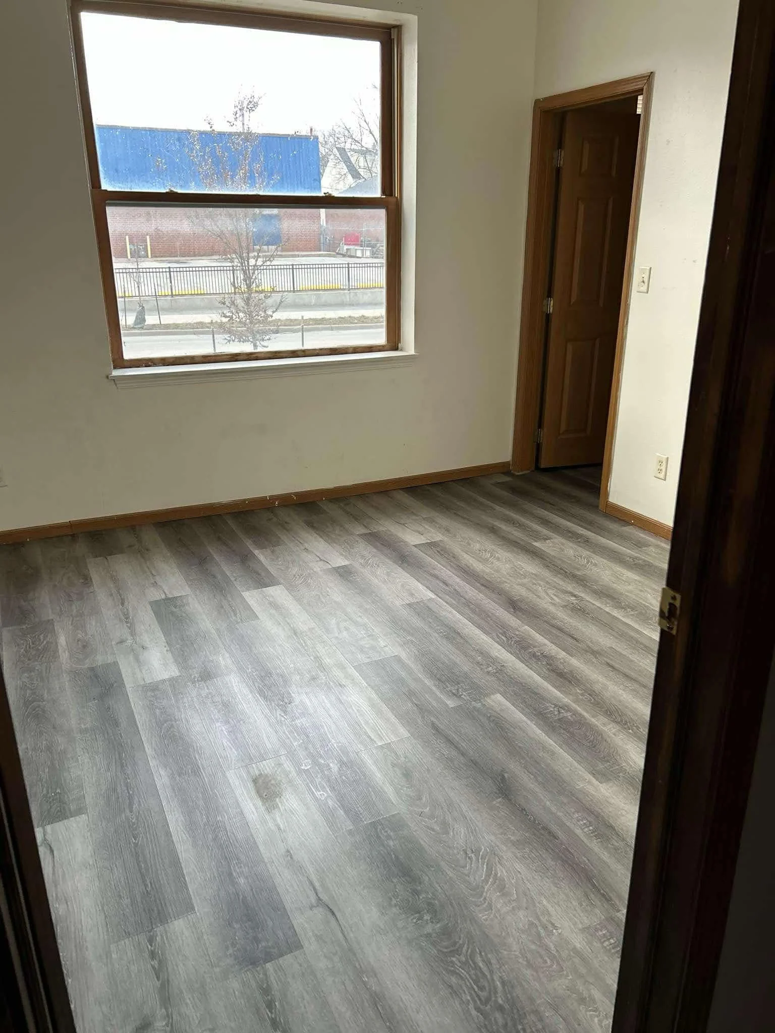 Finished plank flooring in an interior room